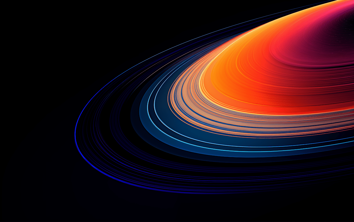 Abstract cosmic rings with vibrant colors on a black background, creating a dynamic and fluid visual effect.